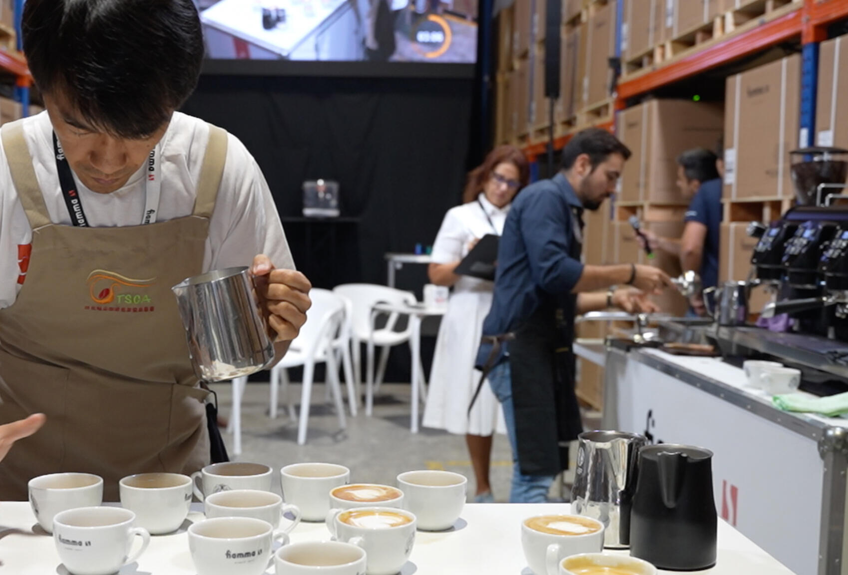 Duoccino Challenge A pair of baristas cocreating cappuccinos